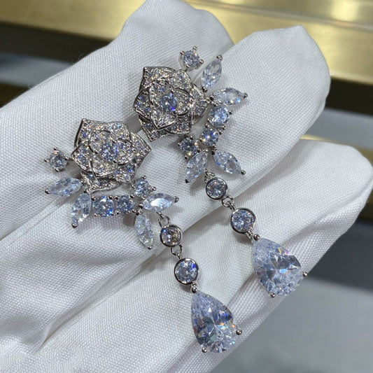 PIAGET ROSE SILVER DROP DIAMOND EARRINGS