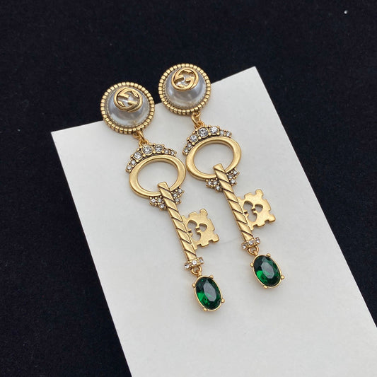 GUCCI KEY SHAPED DANGLE  EARRING