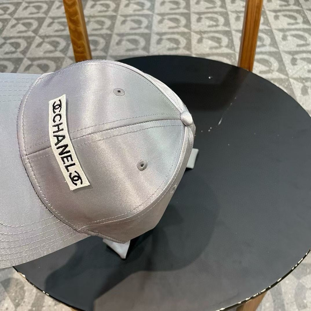 CHANEL BASEBALL HAT IN SILVER SILK SATIN 404865
