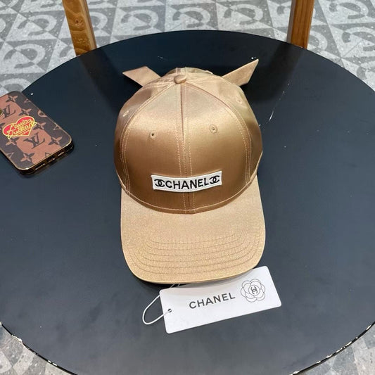 CHANEL BASEBALL HAT IN GOLD SILK SATIN 404866