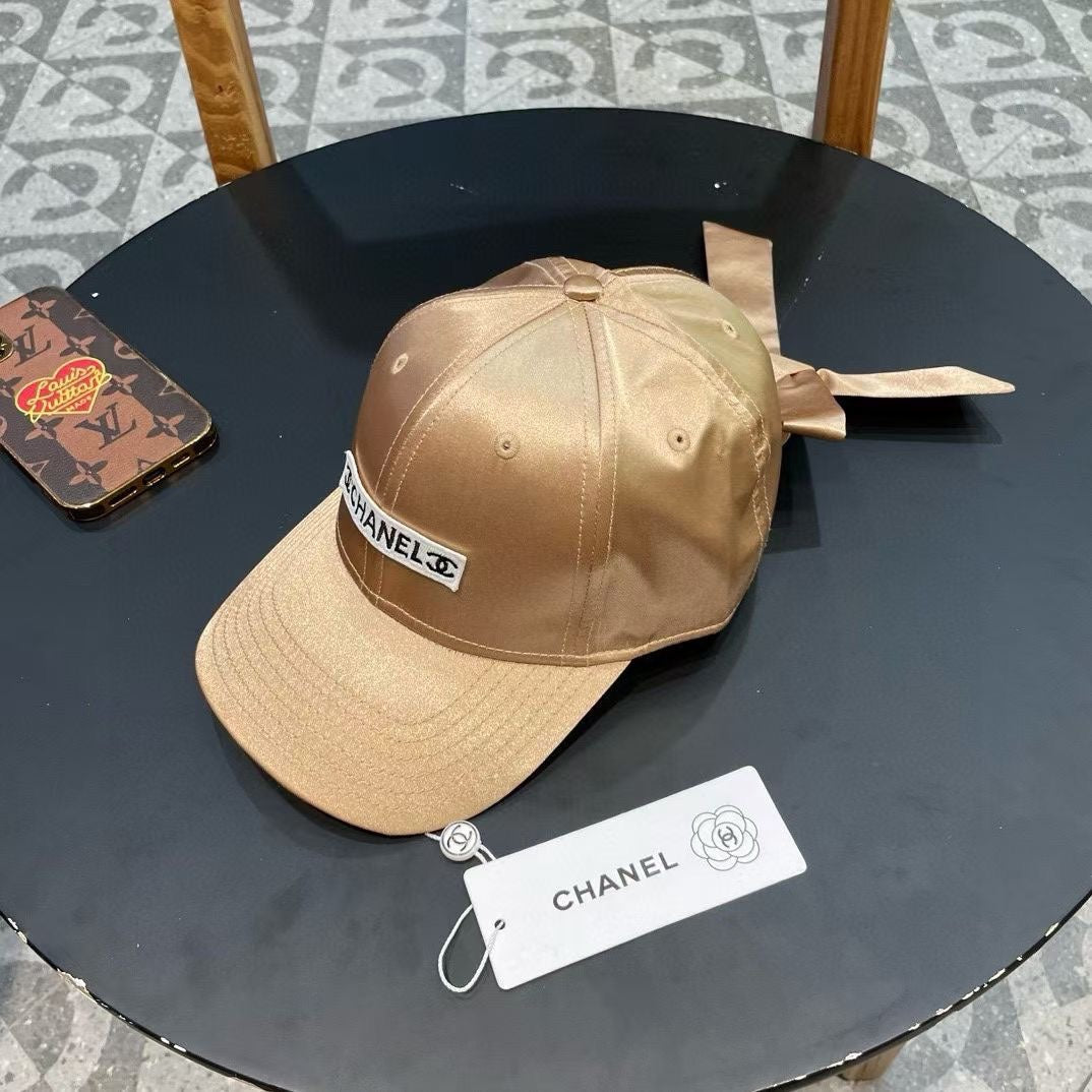 CHANEL BASEBALL HAT IN GOLD SILK SATIN 404866