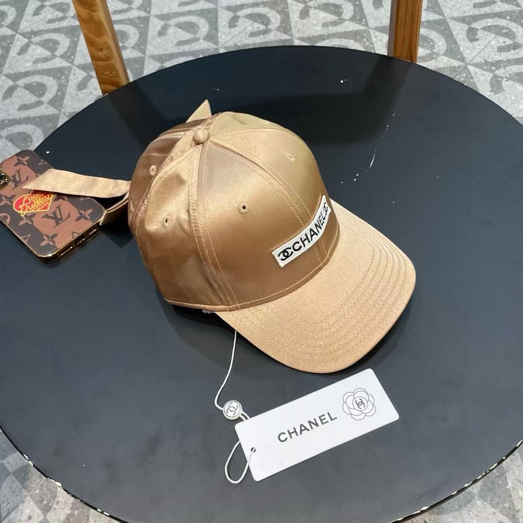 CHANEL BASEBALL HAT IN GOLD SILK SATIN 404866