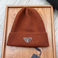 PRADA BEANIE HAT IN RED BROWN WOOL 332398