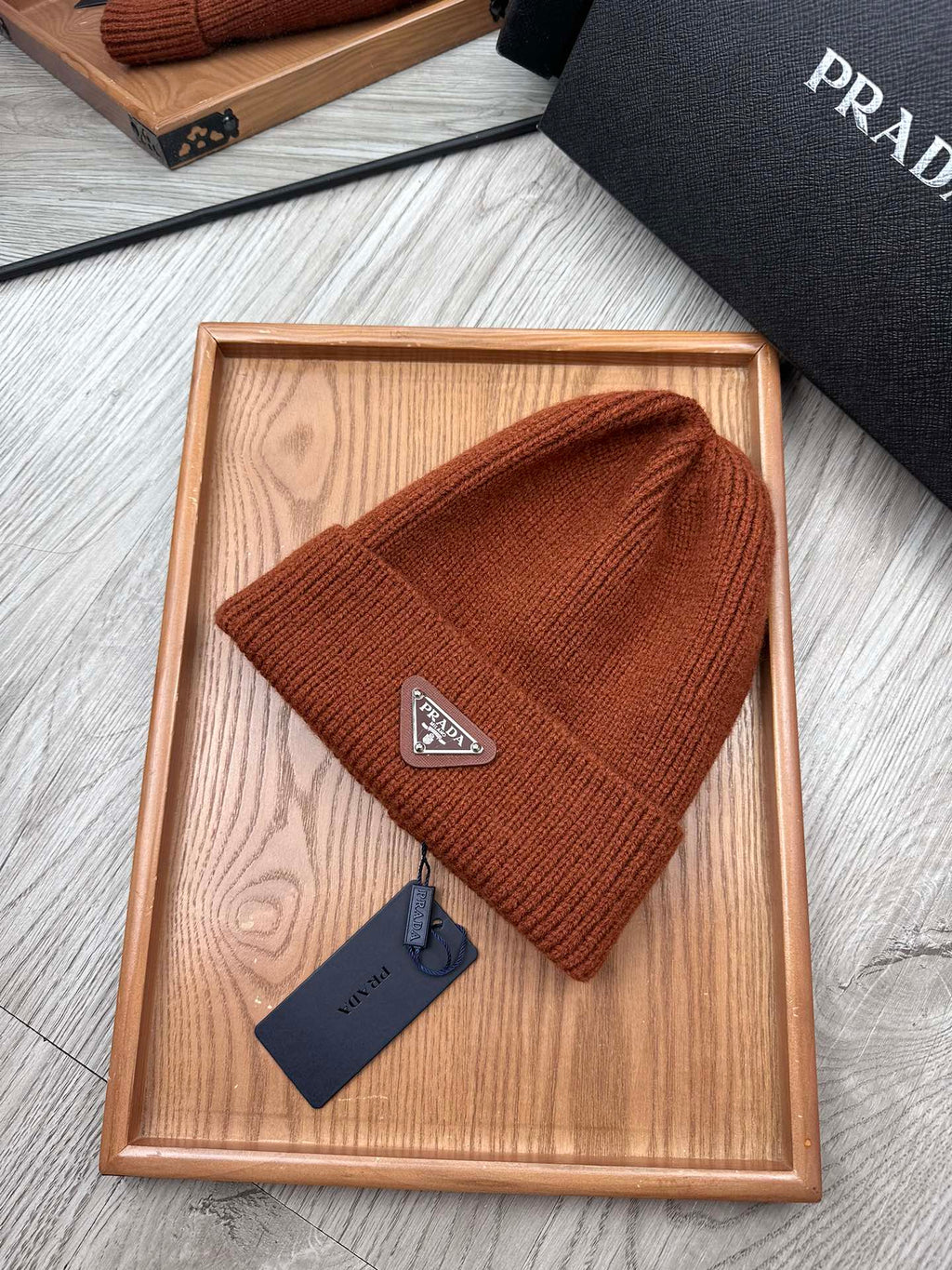 PRADA BEANIE HAT IN RED BROWN WOOL 332398