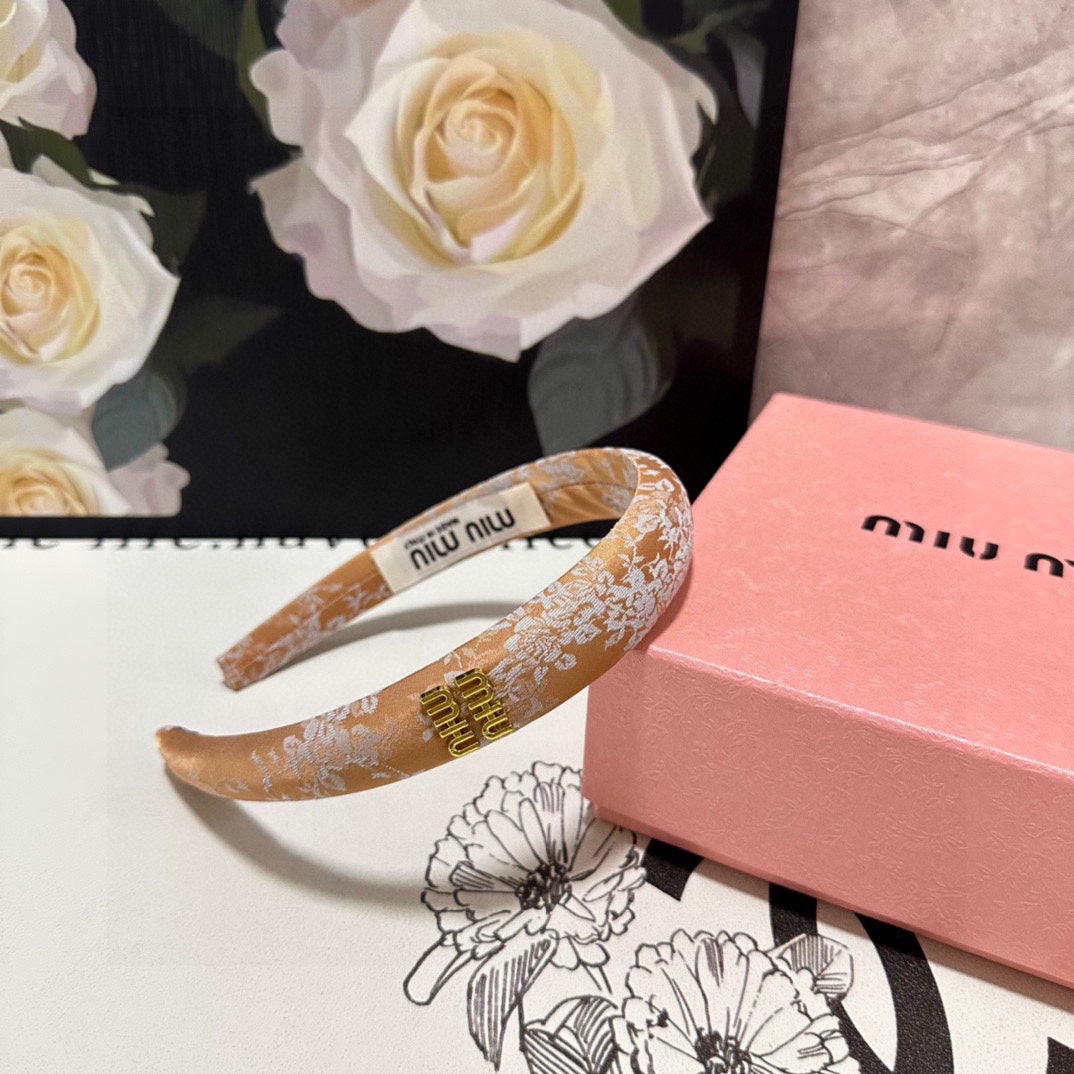 CHANEL HEADBAND WITH GARNITURE PRINT IN TIGER EYE ORANGE SILK 432822