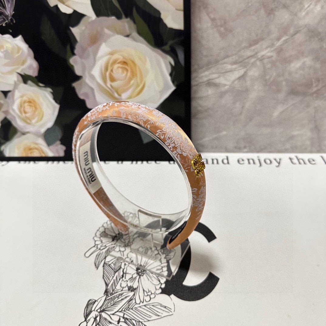 CHANEL HEADBAND WITH GARNITURE PRINT IN TIGER EYE ORANGE SILK 432822