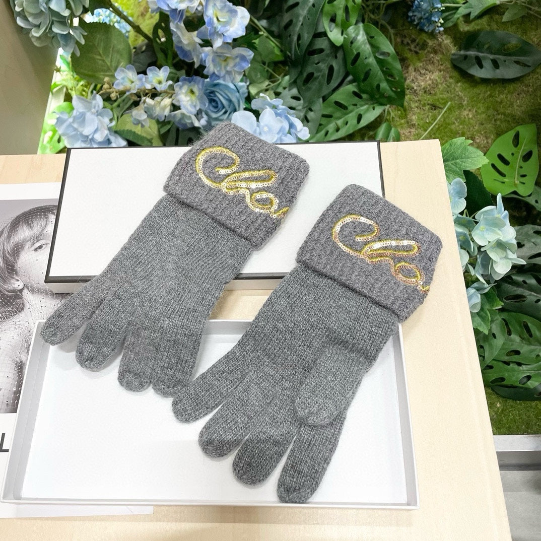 CHANEL GLOVES IN DOVE GRAY WOOL WITH YELLOW LOGO 465777